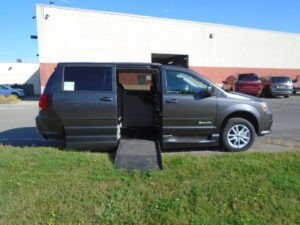 Grey Dodge Grand Caravan with BraunAbility Side Entry Automatic Fold Out conversion