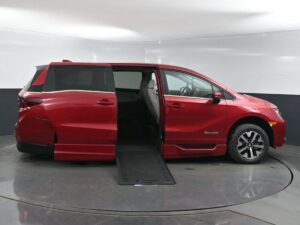 Red Honda Odyssey with BraunAbility Side Entry Automatic In Floor conversion