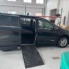 Black Chrysler Voyager with Driverge Side Entry Automatic Fold Out conversion