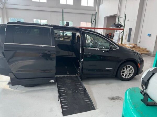 Black Chrysler Voyager with Driverge Side Entry Automatic Fold Out conversion