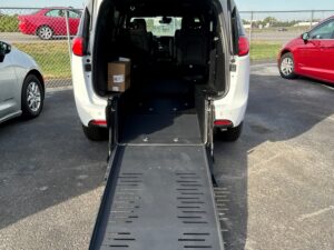 White Chrysler Voyager with BraunAbility Rear Entry Manual Fold Out conversion