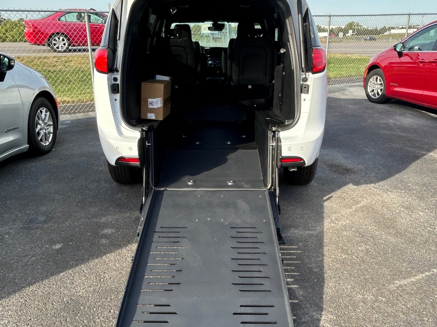 White Chrysler Voyager with BraunAbility Rear Entry Manual Fold Out conversion