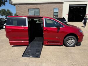 Red Chrysler Pacifica with BraunAbility Side Entry Automatic Fold Out conversion
