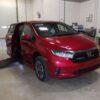 Red Honda Odyssey with BraunAbility Side Entry Automatic In Floor conversion