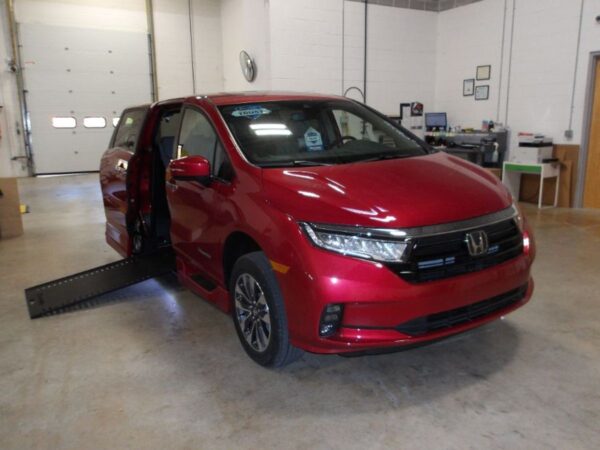 Red Honda Odyssey with BraunAbility Side Entry Automatic In Floor conversion