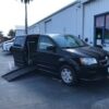 Black Dodge Grand Caravan with BraunAbility Side Entry Automatic Fold Out conversion
