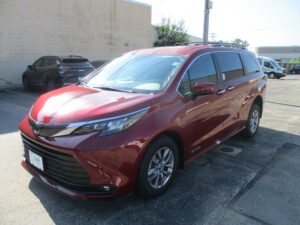 Red Toyota Sienna with Driverge Rear Entry Manual Fold Out conversion