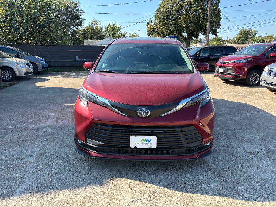 Red Toyota Sienna with Driverge Rear Entry Manual Fold Out conversion