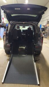 Grey Toyota Sienna with Driverge Rear Entry Manual Fold Out conversion