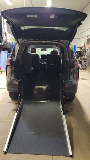 Grey Toyota Sienna with Driverge Rear Entry Manual Fold Out conversion