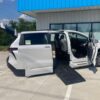 White Toyota Sienna with BraunAbility Side Entry Automatic Fold Out conversion