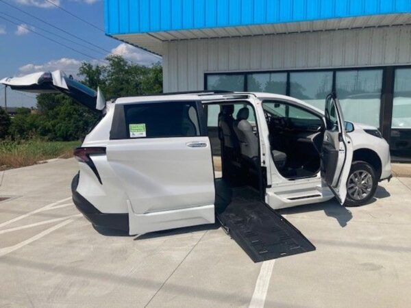 White Toyota Sienna with BraunAbility Side Entry Automatic Fold Out conversion