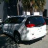 White Chrysler Voyager with Driverge Side Entry Automatic Fold Out conversion