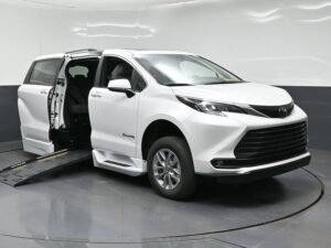 White Toyota Sienna with BraunAbility Side Entry Automatic Fold Out conversion