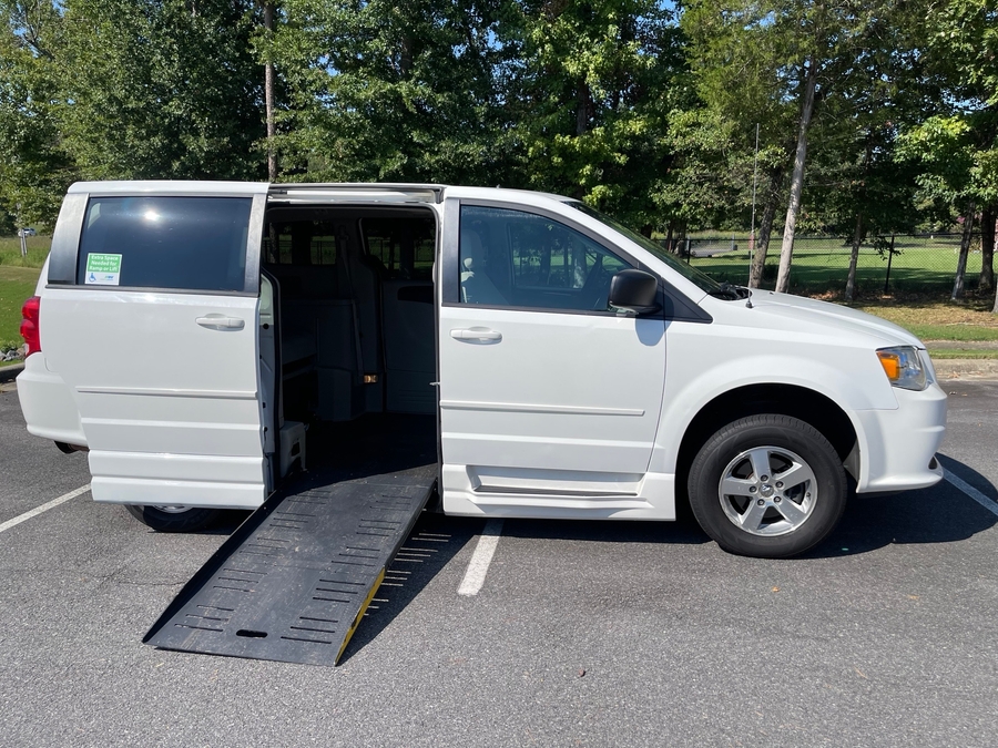 White Dodge Grand Caravan with BraunAbility Side Entry Automatic Fold Out conversion