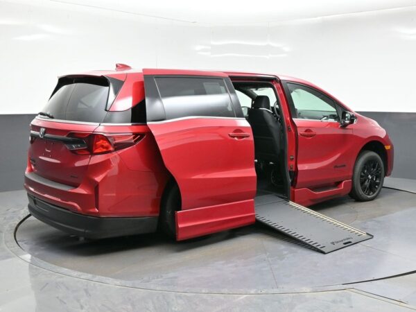 Red Honda Odyssey with BraunAbility Side Entry Automatic In Floor conversion