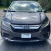Grey Honda Odyssey with BraunAbility Side Entry Automatic In Floor conversion