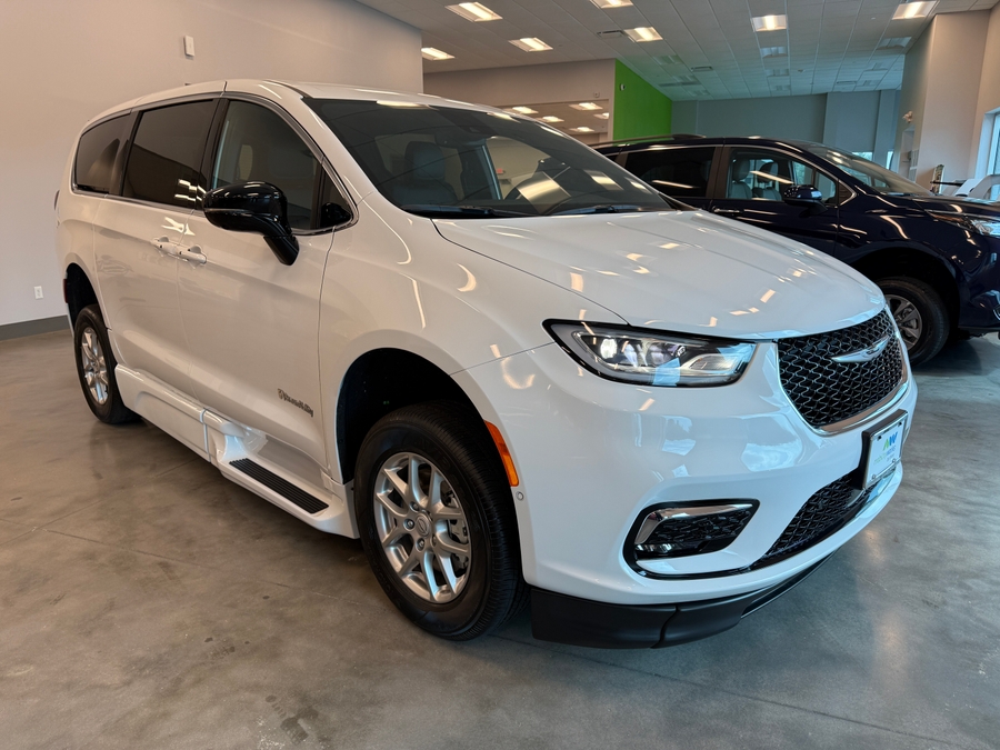 White Chrysler Pacifica with BraunAbility Side Entry Automatic Fold Out conversion