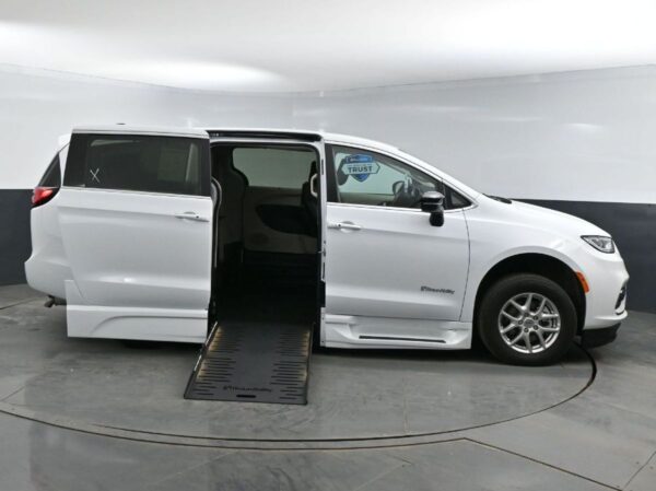 White Chrysler Pacifica with BraunAbility Side Entry Automatic Fold Out conversion