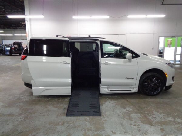 White Chrysler Pacifica with BraunAbility Side Entry Automatic Fold Out conversion