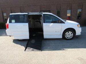 White Dodge Grand Caravan with BraunAbility Side Entry Manual Fold Out conversion