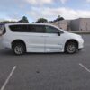White Chrysler Pacifica with BraunAbility Side Entry Automatic Fold Out conversion