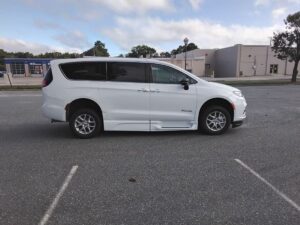 White Chrysler Pacifica with BraunAbility Side Entry Automatic Fold Out conversion
