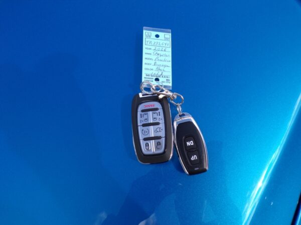 Blue Chrysler Pacifica with Driverge Side Entry Automatic Fold Out conversion