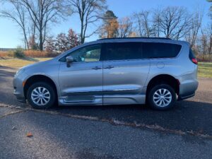 Silver Chrysler Pacifica with BraunAbility Side Entry Automatic In Floor conversion