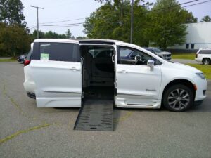 White Chrysler Pacifica with BraunAbility Side Entry Automatic Fold Out conversion