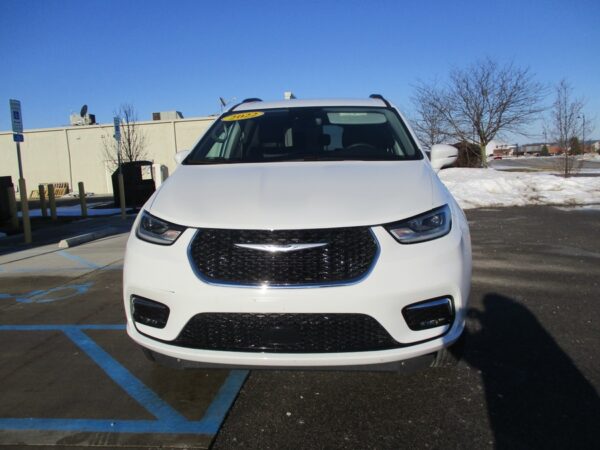 White Chrysler Pacifica with Driverge Side Entry Automatic Fold Out conversion