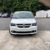 White Dodge Grand Caravan with Driverge Side Entry Automatic Fold Out conversion