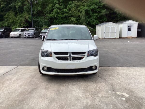 White Dodge Grand Caravan with Driverge Side Entry Automatic Fold Out conversion