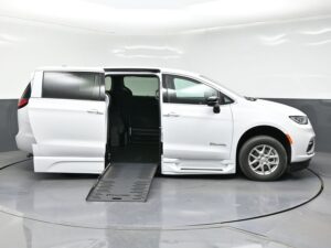 White Chrysler Pacifica with BraunAbility Side Entry Automatic Fold Out conversion