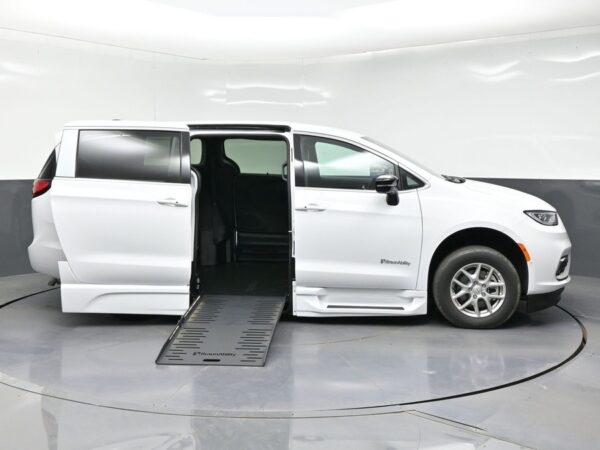 White Chrysler Pacifica with BraunAbility Side Entry Automatic Fold Out conversion