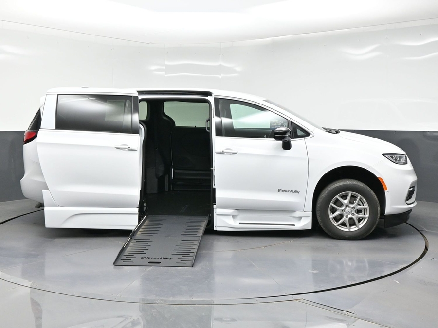 White Chrysler Pacifica with BraunAbility Side Entry Automatic Fold Out conversion