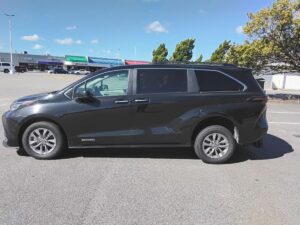 Black Toyota Sienna with Driverge Rear Entry Manual Fold Out conversion