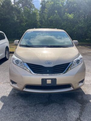Brown Toyota Sienna with BraunAbility Side Entry Automatic In Floor conversion