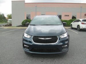 Blue Chrysler Pacifica with BraunAbility Side Entry Automatic In Floor conversion