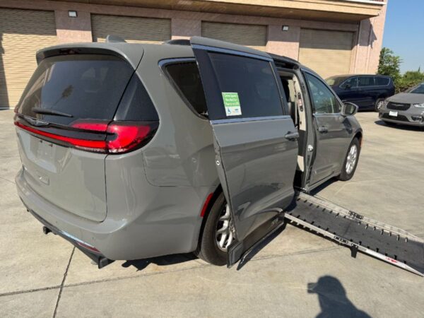 Grey Chrysler Pacifica with Adaptive Vans Side Entry Automatic Fold Out conversion