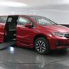 Red Honda Odyssey with BraunAbility Side Entry Automatic In Floor conversion