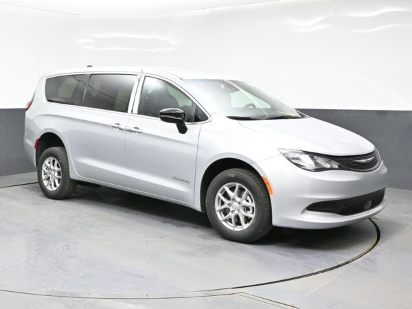 Silver Chrysler Voyager with BraunAbility Rear Entry Manual Fold Out conversion