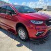 Red Chrysler Pacifica with BraunAbility Side Entry Automatic In Floor conversion