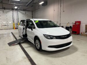 White Chrysler Voyager with Driverge Side Entry Automatic Fold Out conversion