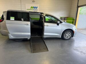 Silver Chrysler Pacifica with Driverge Side Entry Automatic Fold Out conversion