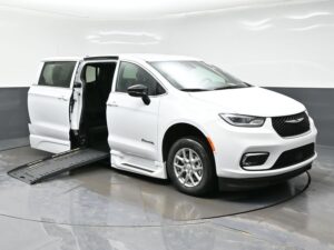 White Chrysler Pacifica with BraunAbility Side Entry Automatic Fold Out conversion