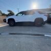 White Chevrolet Traverse with BraunAbility Side Entry Automatic In Floor conversion