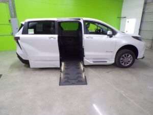 White Toyota Sienna with BraunAbility Side Entry Automatic Fold Out conversion