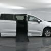 White Chrysler Voyager with BraunAbility Side Entry Automatic Fold Out conversion