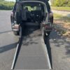 Black Toyota Sienna with Driverge Rear Entry Manual Fold Out conversion